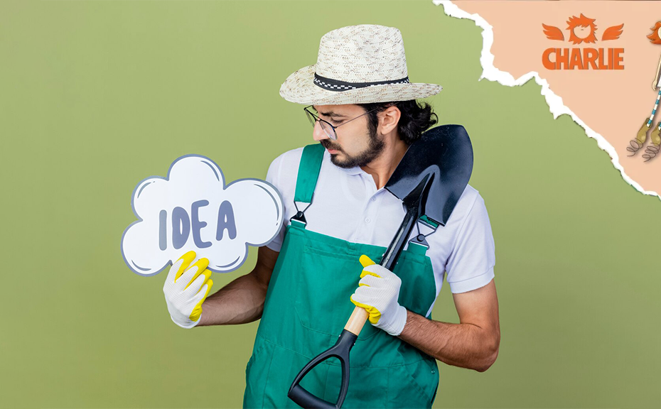 joven jardinero barbudo con mono y sombrero sosteniendo una pala, cartel con bocadillo de diálogo y la palabra "idea" mirándolo con expresión de desconcierto, de pie, verde claro